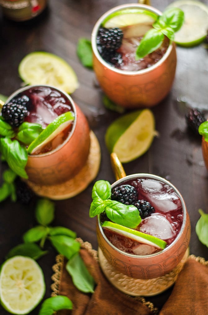 Blackberry Basil Moscow Mules. If you're a Moscow Mule fan, you're going to love this vibrant, simple spin on the popular cocktail! | hostthetoast.com