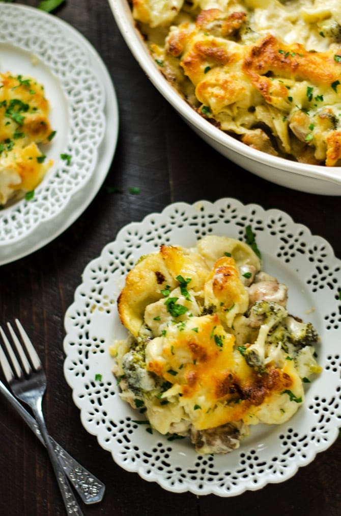 30 Minute Chicken and Broccoli Tortellini Alfredo Bake. This quick and easy weeknight dinner features juicy chicken chunks, tender broccoli, creamy homemade Alfredo sauce, velvety tortellini, and of course, plenty of cheese. | hostthetoast.com