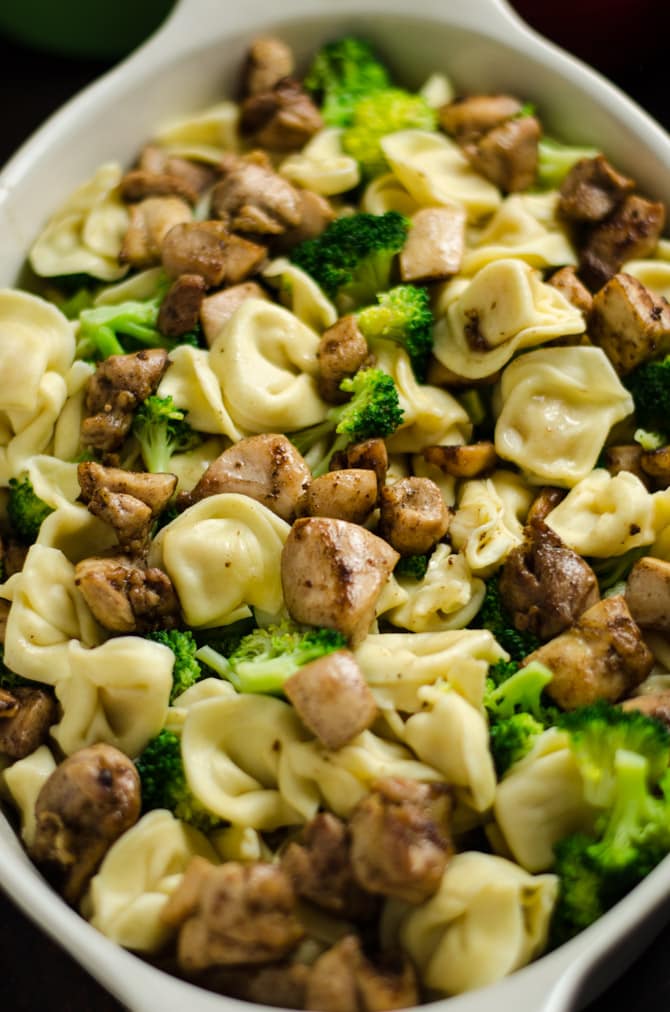 30 Minute Chicken and Broccoli Tortellini Alfredo Bake. This quick and easy weeknight dinner features juicy chicken chunks, tender broccoli, creamy homemade Alfredo sauce, velvety tortellini, and of course, plenty of cheese. | hostthetoast.com