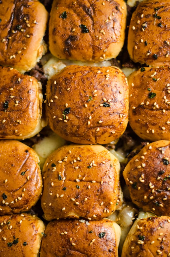 French Onion Beef Sliders For A Crowd. This is one appetizer recipe you don't want to skip. Serve it for the Super Bowl and watch how quickly these little sandwiches disappear. | hostthetoast.com