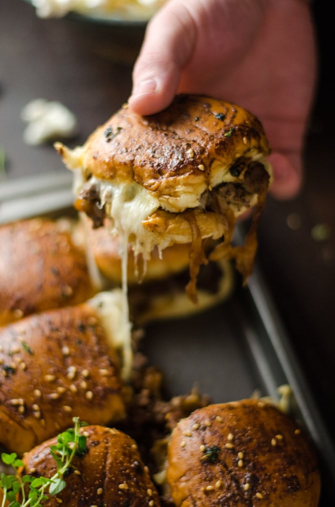 French Onion Beef Sliders For A Crowd. This is one appetizer recipe you don't want to skip. Serve it for the Super Bowl and watch how quickly these little sandwiches disappear. | hostthetoast.com