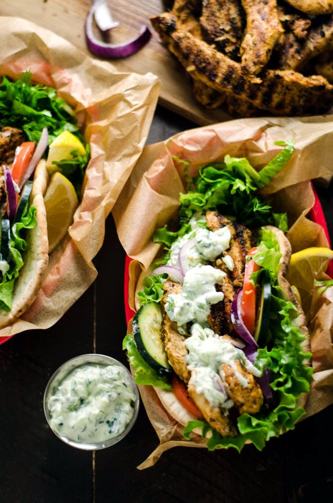 30 Minute Chicken Gyros with Tzatziki. These super easy-to-make Greek-style sandwiches are filled with lemony chicken and cooling cucumber tzatziki. Perfect for a weeknight! | hostthetoast.com