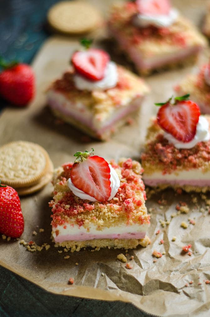 No Bake Strawberry Shortcake Cheesecake Bars. Like the popsicles of your youth, but 100 times better. A rich, sweet, tangy, and delicious dessert. | hostthetoast.com