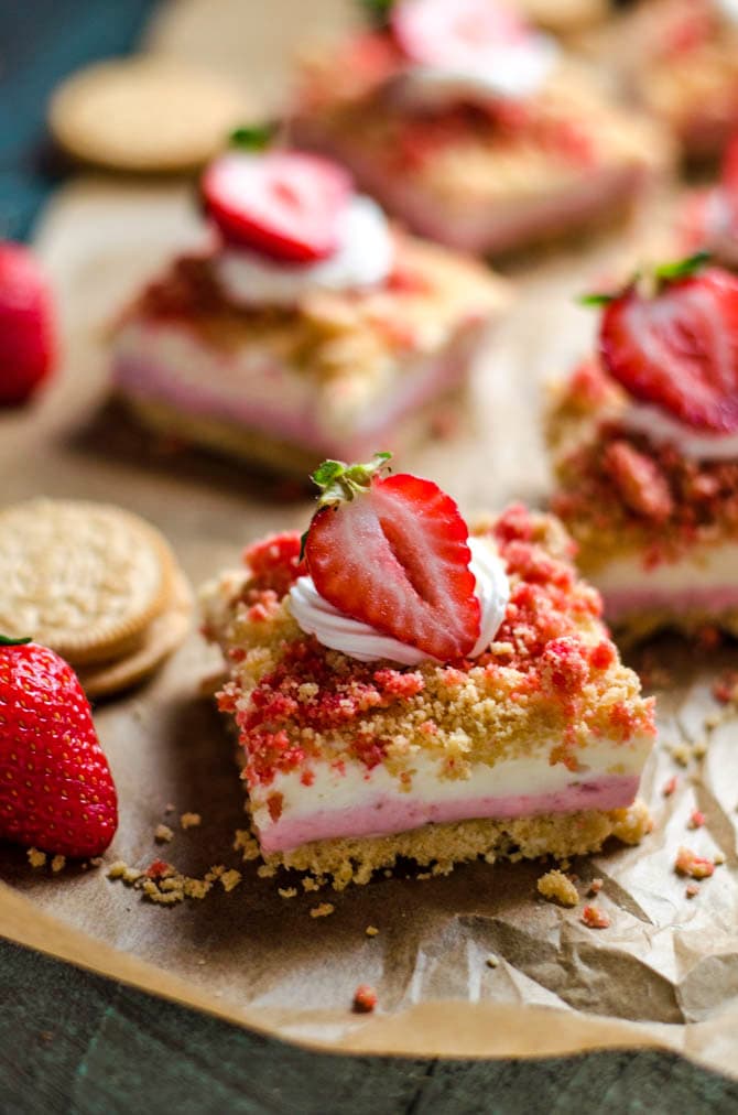 No Bake Strawberry Shortcake Cheesecake Bars. Like the popsicles of your youth, but 100 times better. A rich, sweet, tangy, and delicious dessert. | hostthetoast.com