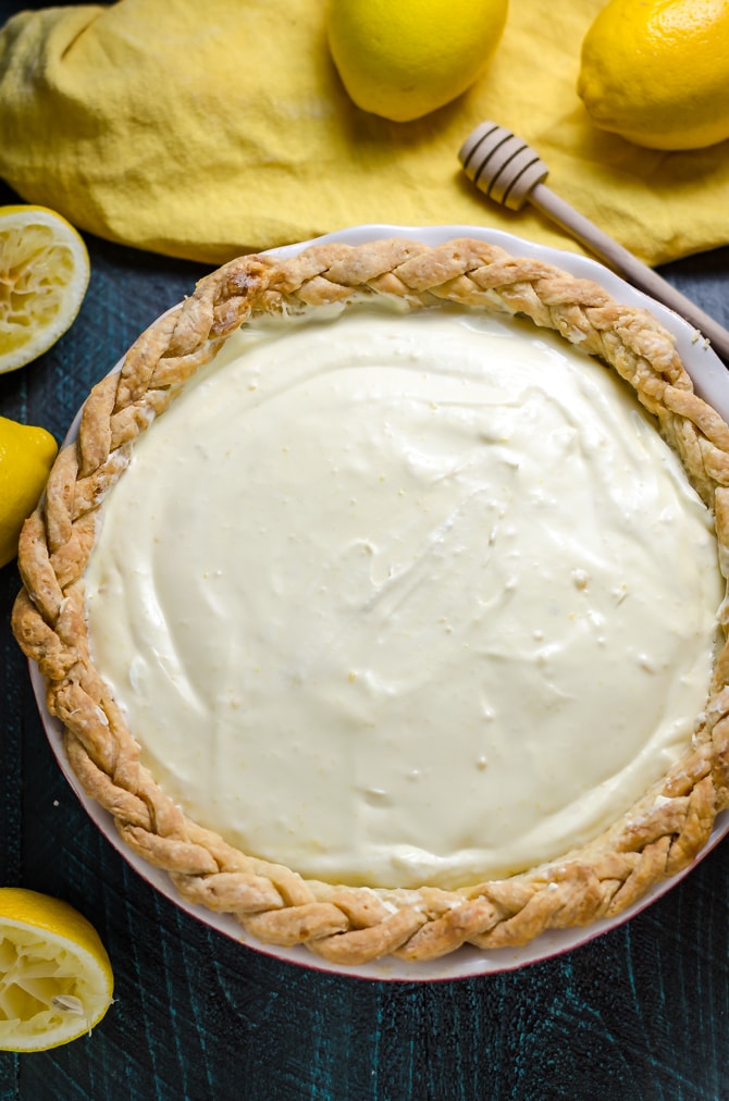 Honey Lemon Chiffon Pie. This sweet warm-weather pie is full of billowy citrus filling and uses some simple techniques to make chocolate bees and a honeycomb top! | hostthetoast.com