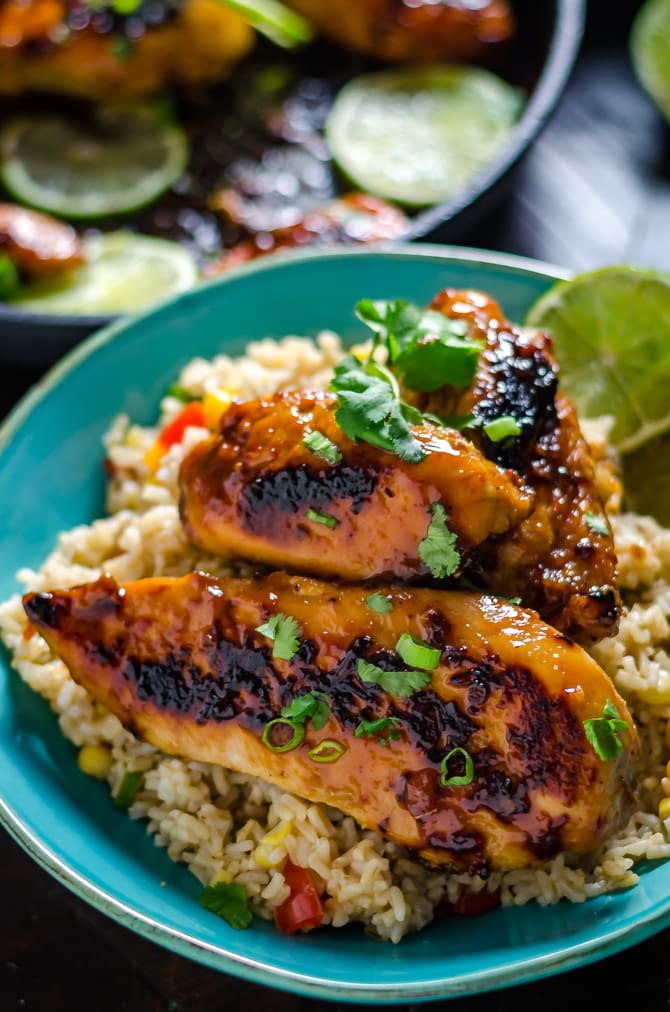 Sticky Chipotle-Peach Chicken. It takes less than an hour to prepare this sweet, spicy, and smoky chicken. And you probably have most of the ingredients on hand already! | hostthetoast.com