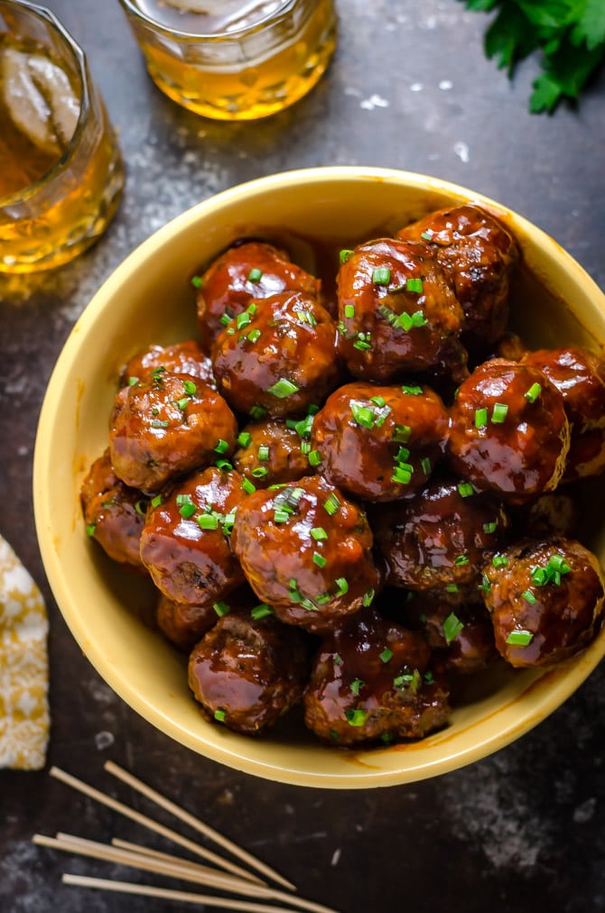 Slow Cooker Sticky Bacon & Whiskey Meatballs. These easy-to-make meatballs are smoky, sweet, and perfect for a party. | hostthetoast.com
