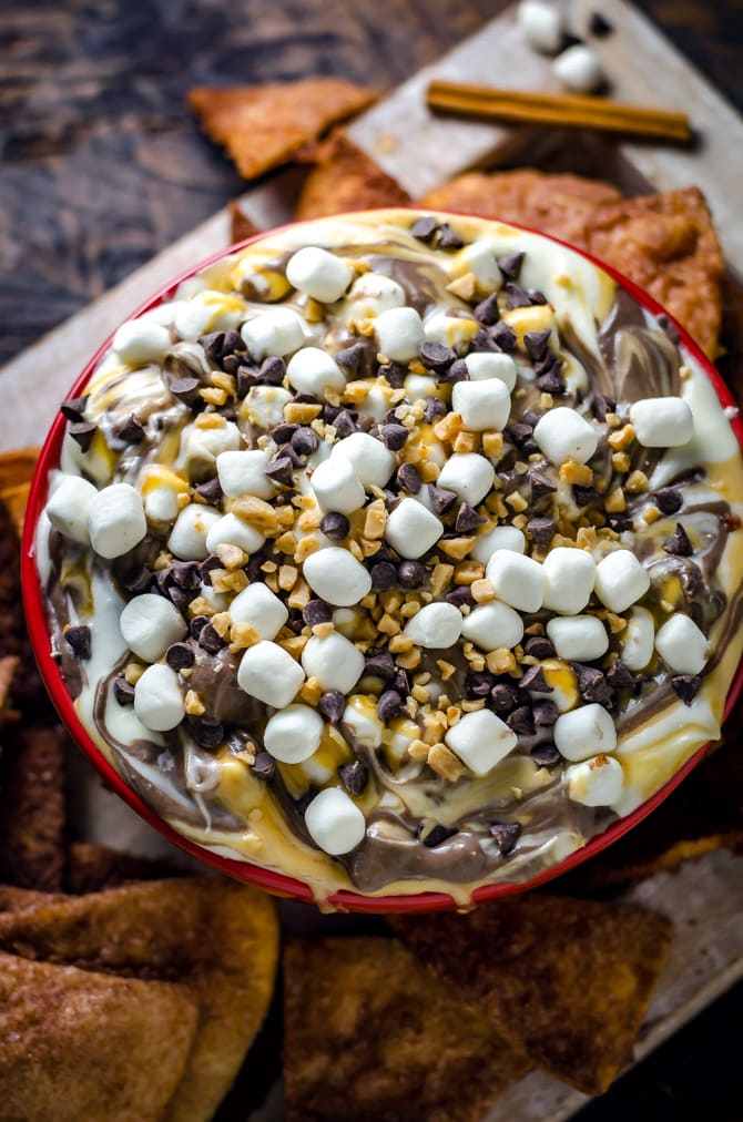 Salted Caramel S'more Dip with Cinnamon Sugar Chips. Calling all dessert-lovers. This sweet recipe, loaded up with marshmallow, chocolate, and caramel, is everything you could want in a treat and then some. | hostthetoast.com