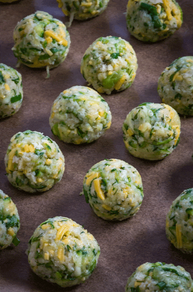 Cheesy Garlic Zucchini Bites. These are easy to make, super flavorful, and baked so they're much healthier than fritters! Serve 'em as snacks, appetizers, or even a side dish! | hostthetoast.com