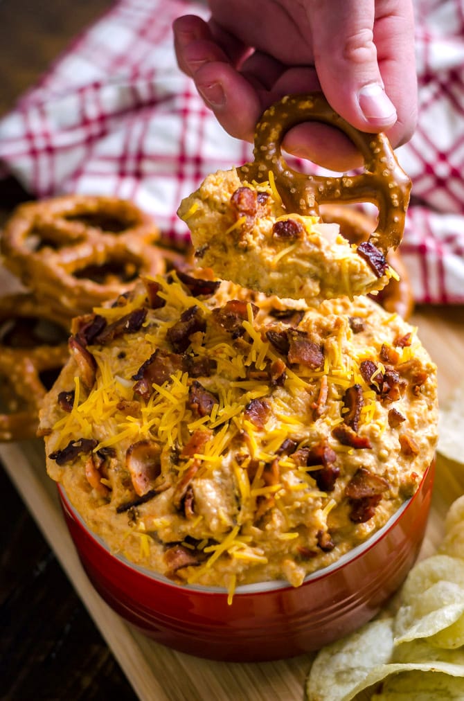 5 Ingredient Cheddar Bacon Horseradish Dip. Forget rushing around to buy food for the party, this simple dip brings it all. It uses just bacon, onions, cheese, sour cream, and horseradish, but is loaded with flavor. It makes a great spread, too! | hostthetoast.com