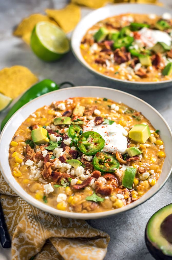 Slow Cooker Mexican Street Corn Chowder. This soup is loaded up with smoky, tangy, spicy, and salty flavors-- you're never going to want regular ol' corn chowder again. | hostthetoast.com
