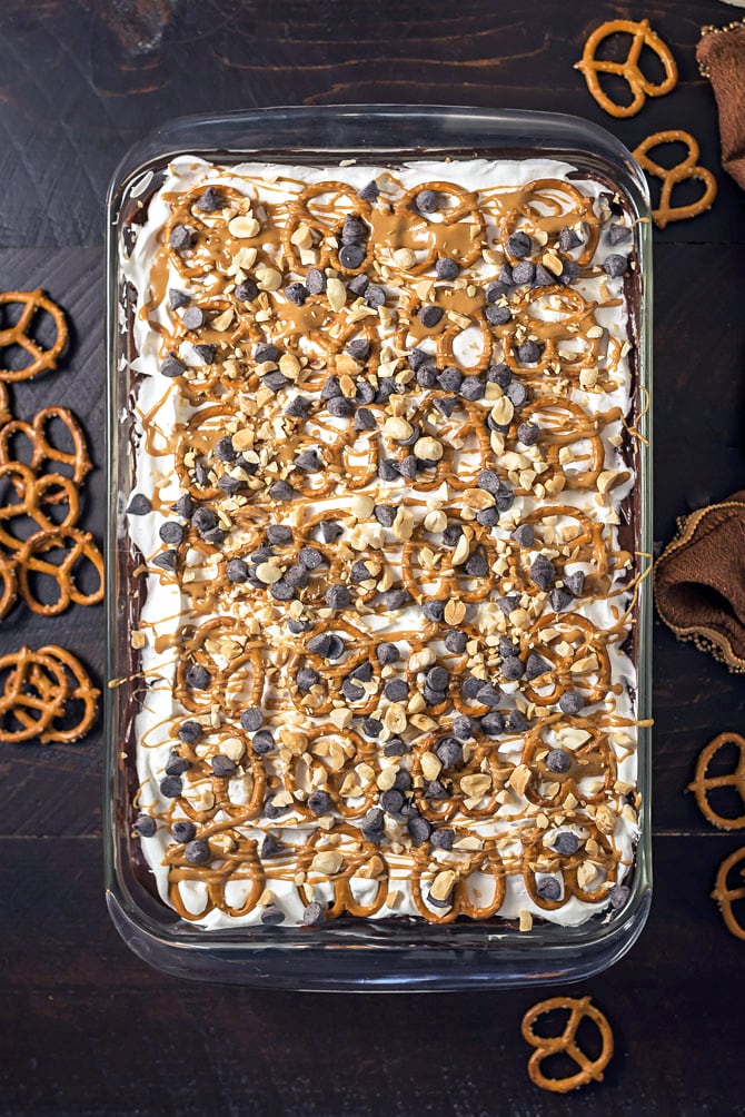 Chocolate Peanut Butter Pretzel Dessert. This easy to make, creamy, chocolatey, sweet-and-salty dessert is exactly what you need to serve a crowd. | hostthetoast.com