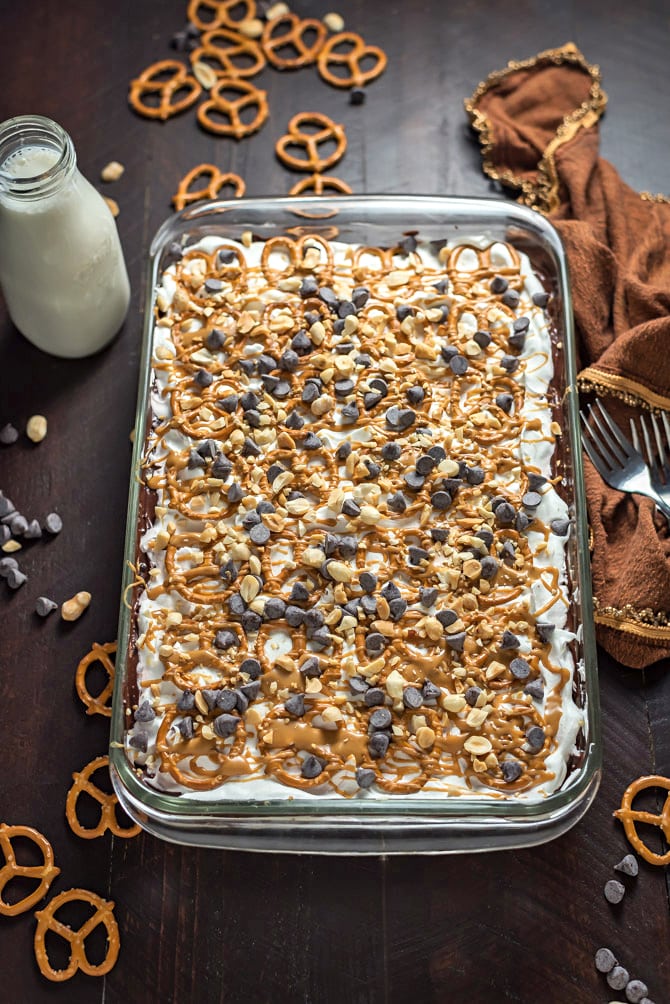 Chocolate Peanut Butter Pretzel Dessert. This easy to make, creamy, chocolatey, sweet-and-salty dessert is exactly what you need to serve a crowd. | hostthetoast.com