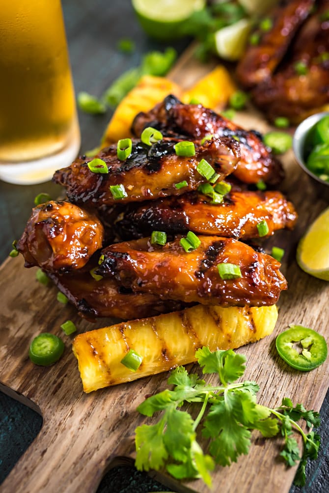 Hawaiian Huli Huli Grilled Chicken Wings. These island-inspired grilled wings are marinated and glazed with with sweet teriyaki flavors. Perfect for a cookout or game day tailgate. | hostthetoast.com