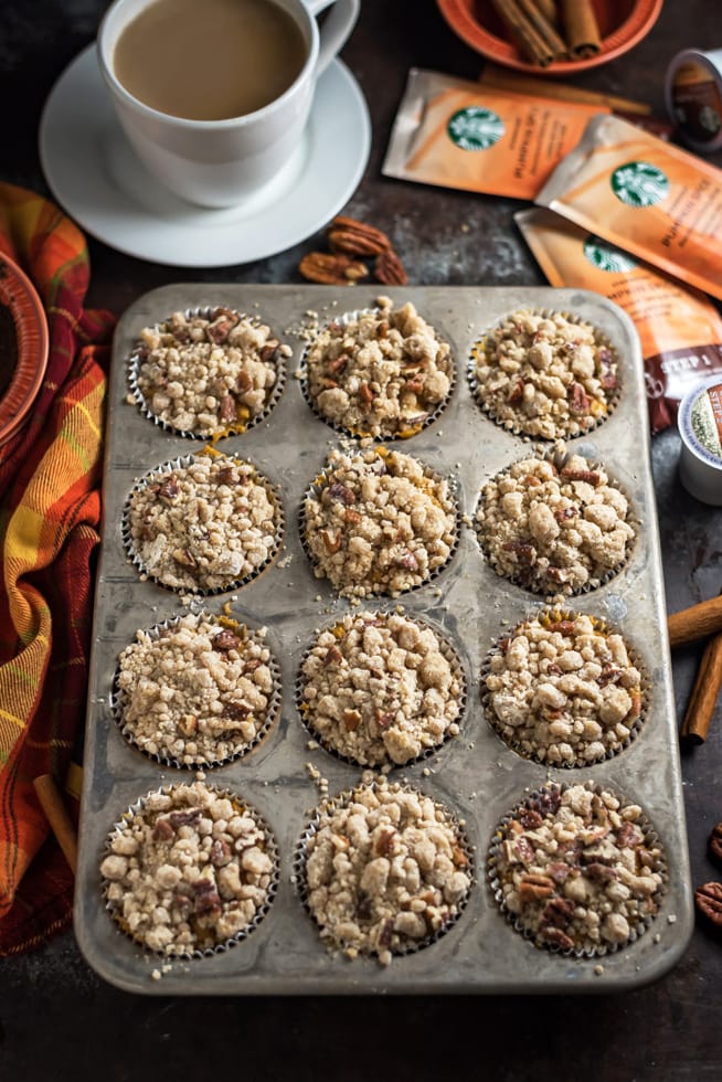 Pumpkin Crumb Muffins with Cream Cheese Glaze. If you love pumpkin spice, you're going to adore these moist and delicious muffins! They make for the perfect fall breakfast. | hostthetoast.com