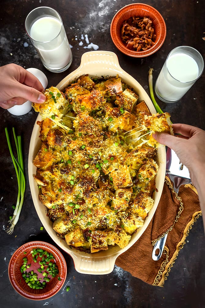 Loaded Pull-Apart Breakfast Bread. Bacon, eggs, cheese, scallions, and everything bagel seasonings make this brunch-friendly recipe a party hit. | hostthetoast.com