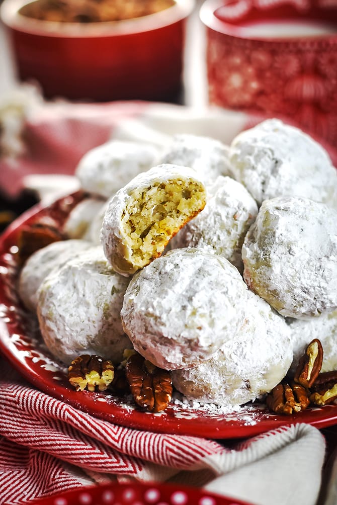 Butter Pecan Snowball Cookies. These tender, tangy, buttery shortbread cookies are loaded with toasted pecans and absolutely perfect for your Christmas cookie platter. | hostthetoast.com