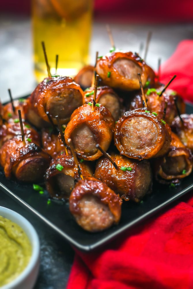 5 Ingredient Bacon-Wrapped Bratwurst Bites. Just wait til you see how easy these sweet, spicy, smoky appetizer bites are to make! | hostthetoast.com