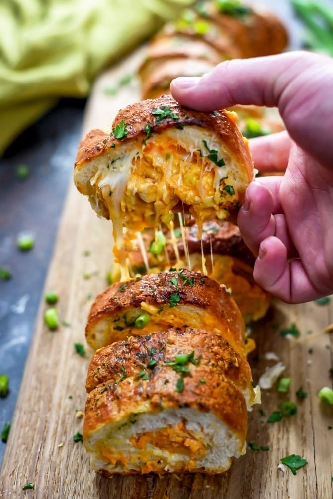 Buffalo Chicken Dip Stuffed Bread. When it comes to appetizers, it doesn't get better than this cheesy stuffed, ranch-brushed bread. Make it for the Super Bowl or your next party and watch it disappear. | hostthetoast.com