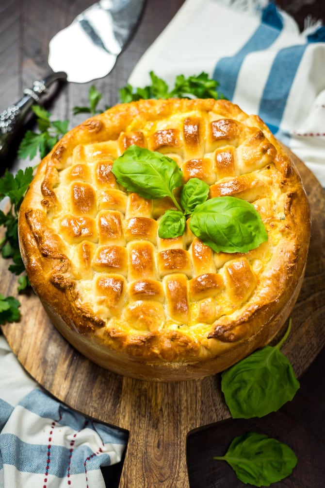 Italian Easter Pie. Also known as Pizza Rustica, Pizza Gaina, or Pizza Chena, this pie is easy to make and loaded with Italian favorites like provolone, mozzarella, ricotta, ham, sausage, pepperoni, and sopressata. | hostthetoast.com