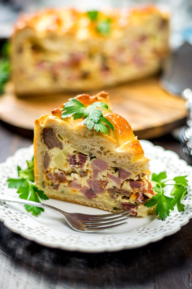 Italian Easter Pie. Also known as Pizza Rustica, Pizza Gaina, or Pizza Chena, this pie is easy to make and loaded with Italian favorites like provolone, mozzarella, ricotta, ham, sausage, pepperoni, and sopressata. | hostthetoast.com