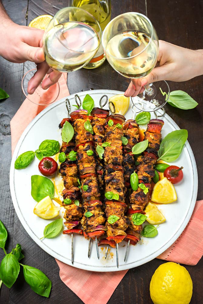 Fiery Italian Chicken Skewers. A homemade spicy pepper with roasted red and hot cherry peppers makes this recipe one you'll want to grill up all summer. | hostthetoast.com