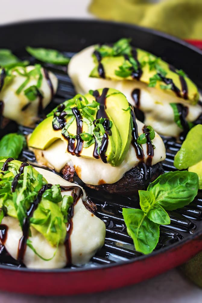 Grilled Avocado Balsamic Chicken. A sweet and tart balsamic vinegar marinade, melted mozzarella cheese, tender grilled chicken, creamy avocado, fresh basil, and a balsamic drizzle come together to create a delicious, easy-to-make dinner. | hostthetoast.com