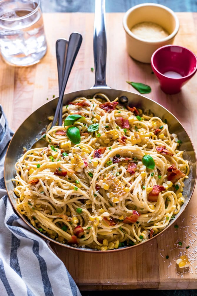 20 Minute Corn Carbonara. This quick and easy pasta dish is filled with fresh corn and bacon, and flavored with a creamy corn-based sauce. No eggs are necessary for this spin on carbonara! | hostthetoast.com