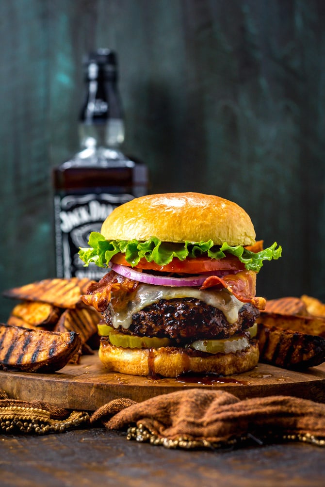 Jack Daniels Burgers. These juicy, glazed cheeseburgers taste just like the ones at TGI Friday's. The sweet, sticky glaze (and a few tips) will take your typical backyard burgers to the next level. | hostthetoast.com