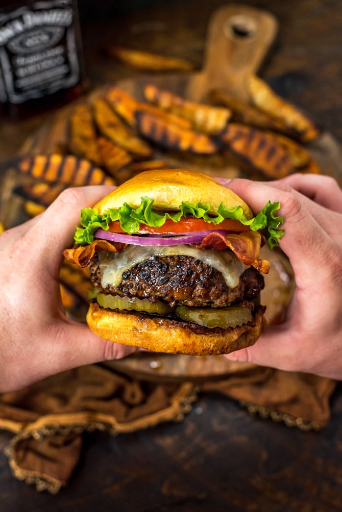 Jack Daniels Burgers. These juicy, glazed cheeseburgers taste just like the ones at TGI Friday's. The sweet, sticky glaze (and a few tips) will take your typical backyard burgers to the next level. | hostthetoast.com