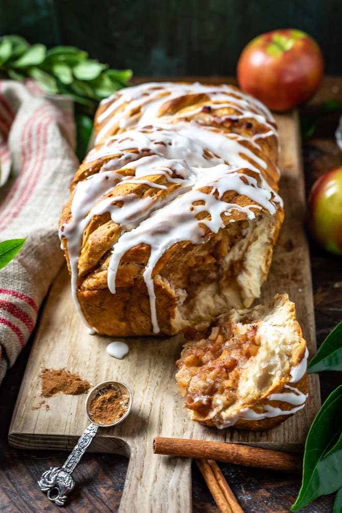 Apple Fritter Pull-Apart Bread with a side torn off and the apple filling exposed.