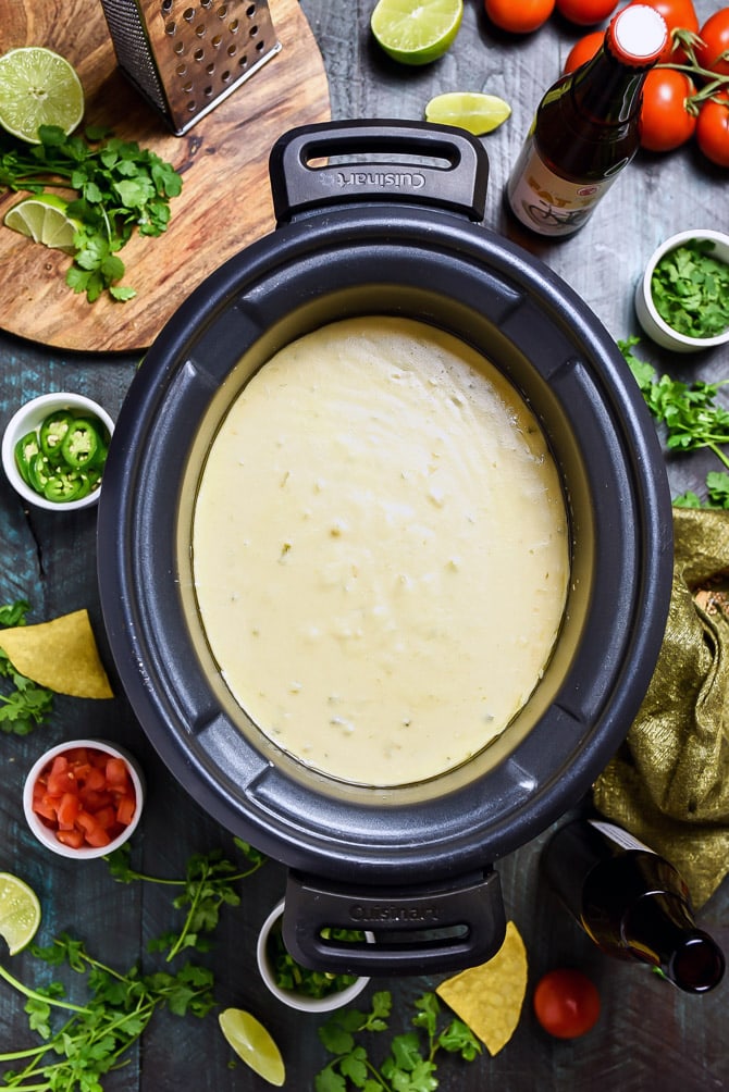 Slow Cooker Queso Blanco. This velvety, rich cheese dip is just as good-- if not better-- than the kind you get from your favorite Mexican restaurant. Serve it straight from the slow cooker (where it will keep warm) at a party, or ladle over nachos. | hostthetoast.com