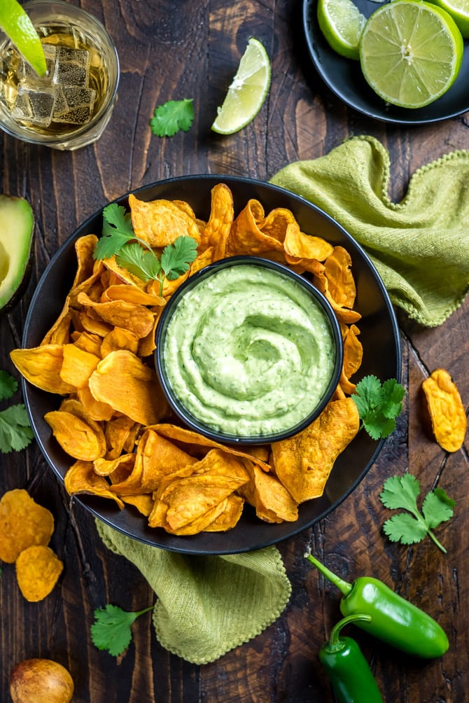 This Dreamy, Creamy Avocado Cilantro Sauce takes just 5 minutes to make and is perfect for serving on tacos, over salads, with sweet potatoes, or simply with a side of chips for dipping. Let's be honest, you're going to eat it on everything. | hostthetoast.com