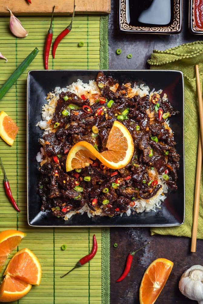 Spicy, Crispy Orange Beef. This version of the Chinese takeout classic features thin slices of crisp sirloin steak that are tossed in a spicy, sweet, and savory orange sauce. You can make it at home in less time than it takes to get delivery. (And it'll taste better, too!) | hostthetoast.com
