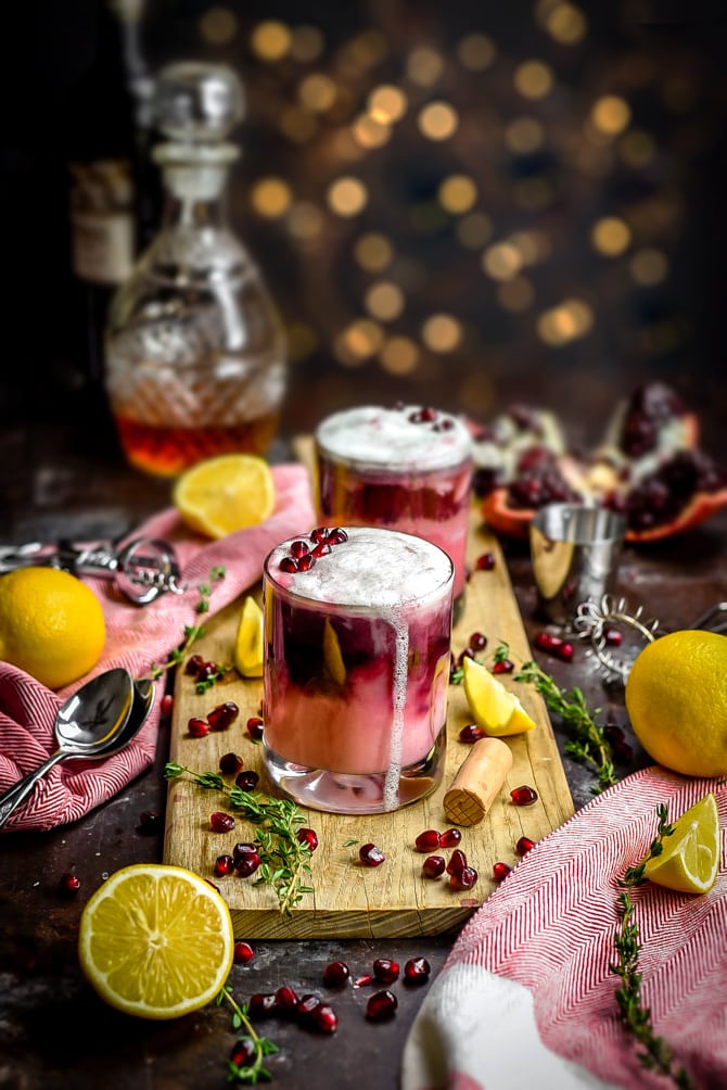 Pomegranate New York Sour. This tart and sweet whiskey cocktail features a red wine float and gorgeously pink, pomegranate-spiked base. It's the perfect cocktail for Valentine's Day, and while it looks impressive and professional, even a cocktail novice can whip it together. | hostthetoast.com