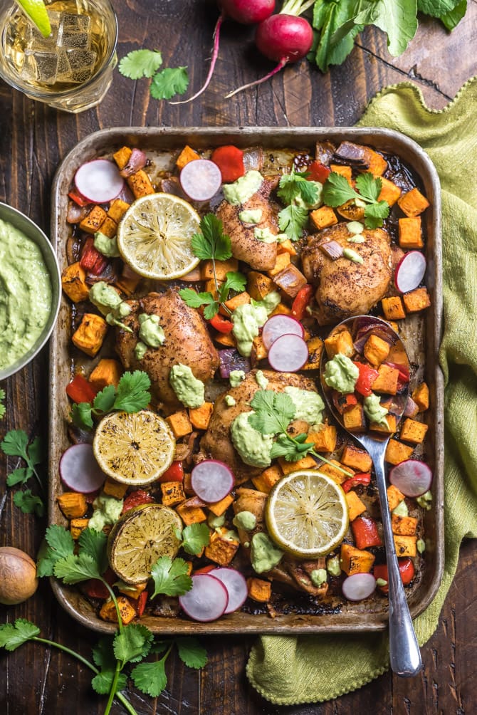 Sheet Pan Chili-Lime Chicken and Sweet Potatoes. Juicy chicken thighs, tender chunks of sweet potato, onion, and bell pepper are all tossed in a spicy, sweet, and citrusy marinade before baking all together for a one pan, healthy recipe. | hostthetoast.com