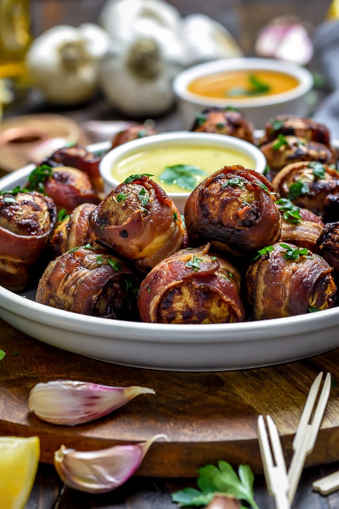 Tender and fluffy on the inside with crisp bacon and a smoky seasoning mix on the outside, Smoky Bacon-Wrapped Baby Potatoes as easy to make as they are to devour. While this recipe technically feeds six, you’ll find these addictive one-bite-wonders are best-served in bulk. | hostthetoast.com
