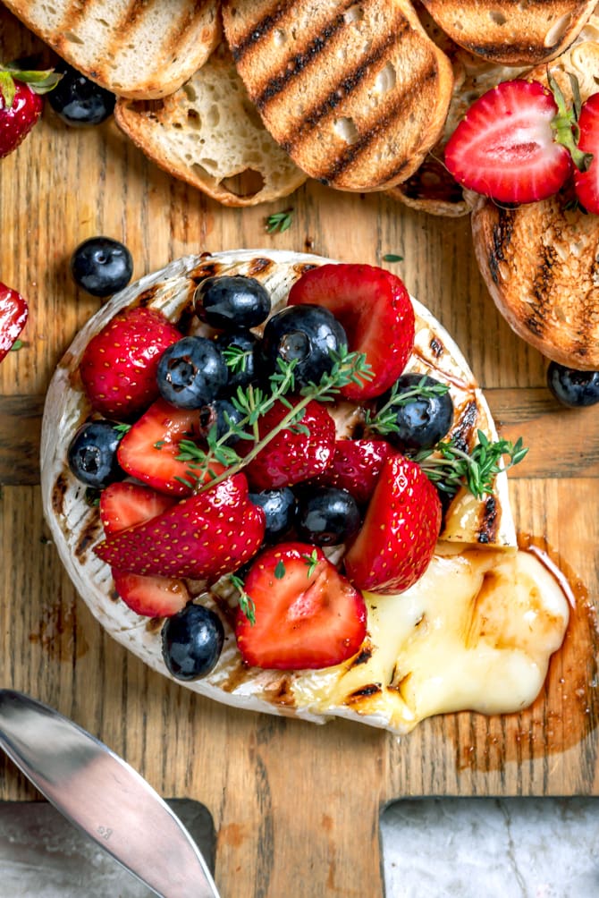 Ready to serve in a few simple steps, Grilled Camembert with Balsamic Macerated Berries is a foolproof dish that will have you seeing stars (and stripes.) | hostthetoast.com