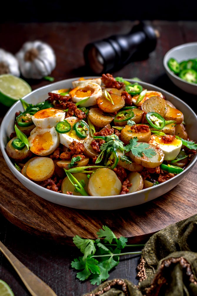 With a whisper of smoke and spice, Warm Chorizo Potato Salad is a Mexican-inspired spin on the German classic. Served with soft-boiled eggs and a chorizo vinaigrette, this mayo-free mash-up is best served warm.   | hostthetoast.com