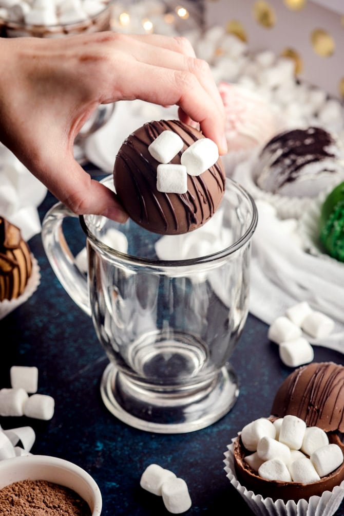 Learn how to make Hot Cocoa Bombs and DIY all of your Christmas gifts this holiday season. These hot cocoa mix and marshmallow stuffed confections will have your friends and family oohing and ahhing as they melt away in warm milk to create the perfect cup of hot chocolate.