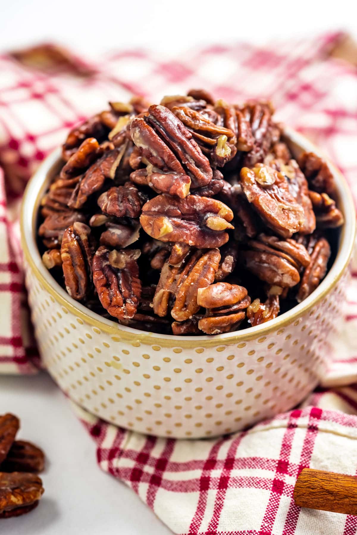 It takes less than 10 minutes to make delicious candied pecans thanks to a simple stovetop shortcut. Use this versatile glazed pecan recipe in salads, cheese boards, baked goods, and more. 