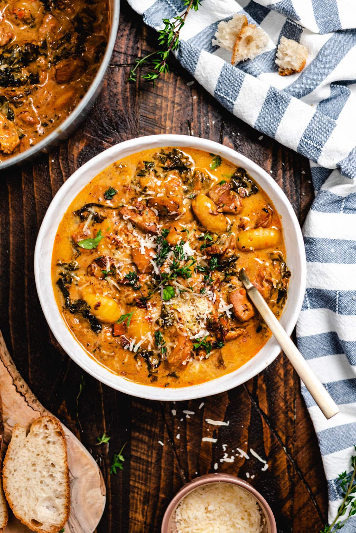 A big bowlful of the coziest Creamy Chicken Gnocchi Soup will have you welcoming chilly winter nights with open arms. Loaded with tender chicken thighs, pillowy gnocchi, a rich delicious broth, and fresh, flavorful vegetables, there's plenty of comfort to go around.